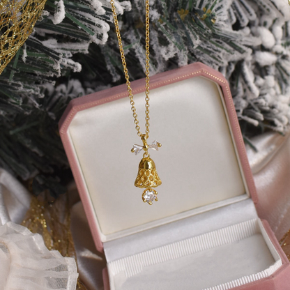 Gold Bell Necklace with Zircon Bow — Festive Pendant Jewelry